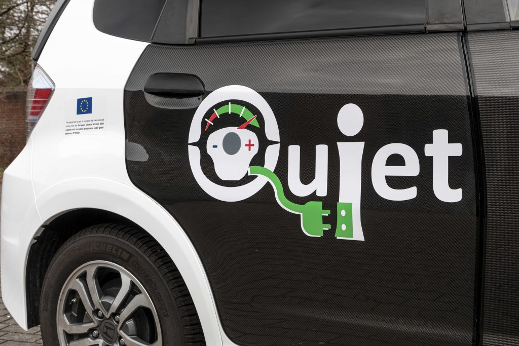 QUIET logo on car decoration.